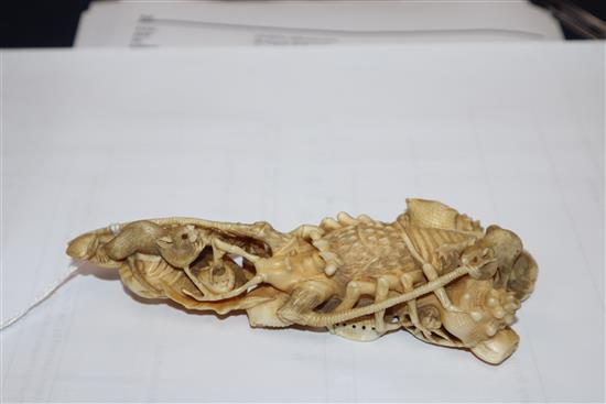 A Japanese ivory okimono of rats crawling over a lobster, early 20th century, unsigned 14.5cm